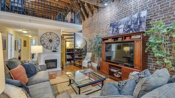 TV connectée, cheminée, Netflix, lecteur de DVD