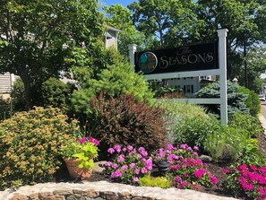 Experience the natural beauty of The Seasons hotel, surrounded by lush gardens and vibrant greenery.