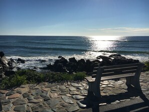 Guests can sit on the bench and enjoy the ocean views.