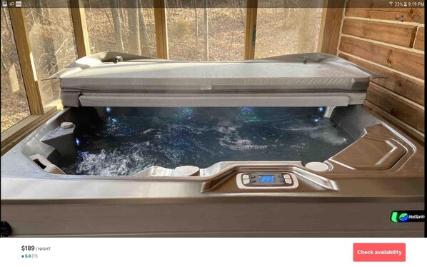 A hot tub with a digital control panel, priced at $189 per night. - Cardinal Cabin with Hot tub, WIFI, Dish, park pass (Birdseye)