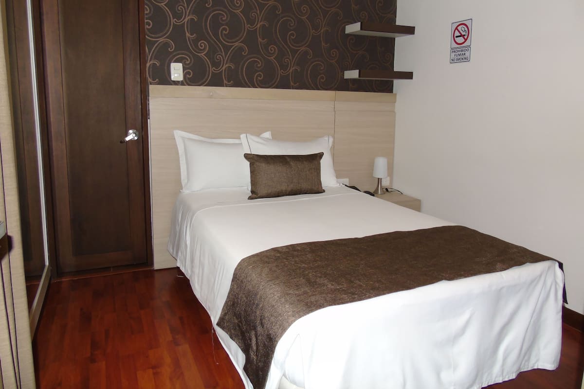 Habitación individual estándar | Cortinas blackout, tabla de planchar con plancha y wifi gratis
