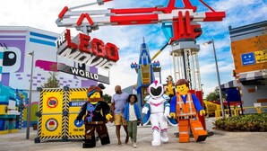 A LEGO-themed area with a large LEGO sign, a crane structure, and LEGO figures. - Boutique South Park Craftsman Studio (San Diego)