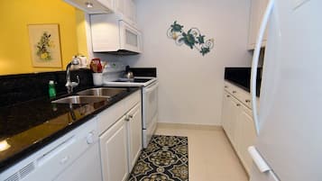Condo (Spanish Cay F6) | Private kitchen | Fridge, microwave, stovetop, dishwasher