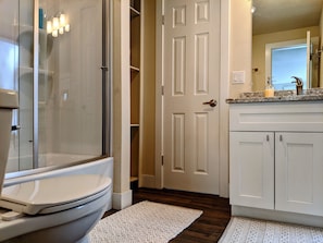 Combined shower/tub, hair dryer, towels, soap