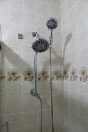 Combined shower/tub, hair dryer, towels, soap