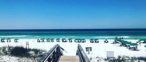 On the beach, sun-loungers, beach towels