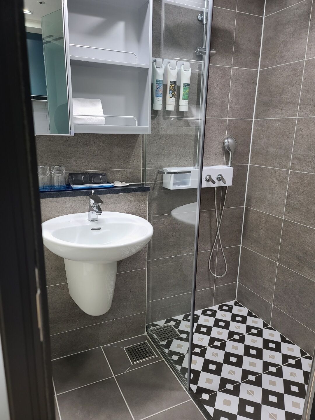 superior double room, 1 double bed, kitchenette, city view | bathroom | shower, hair dryer, towels, soap