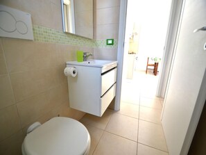 Apartamento, 1 quarto, para fumantes, sacada | Banheiro