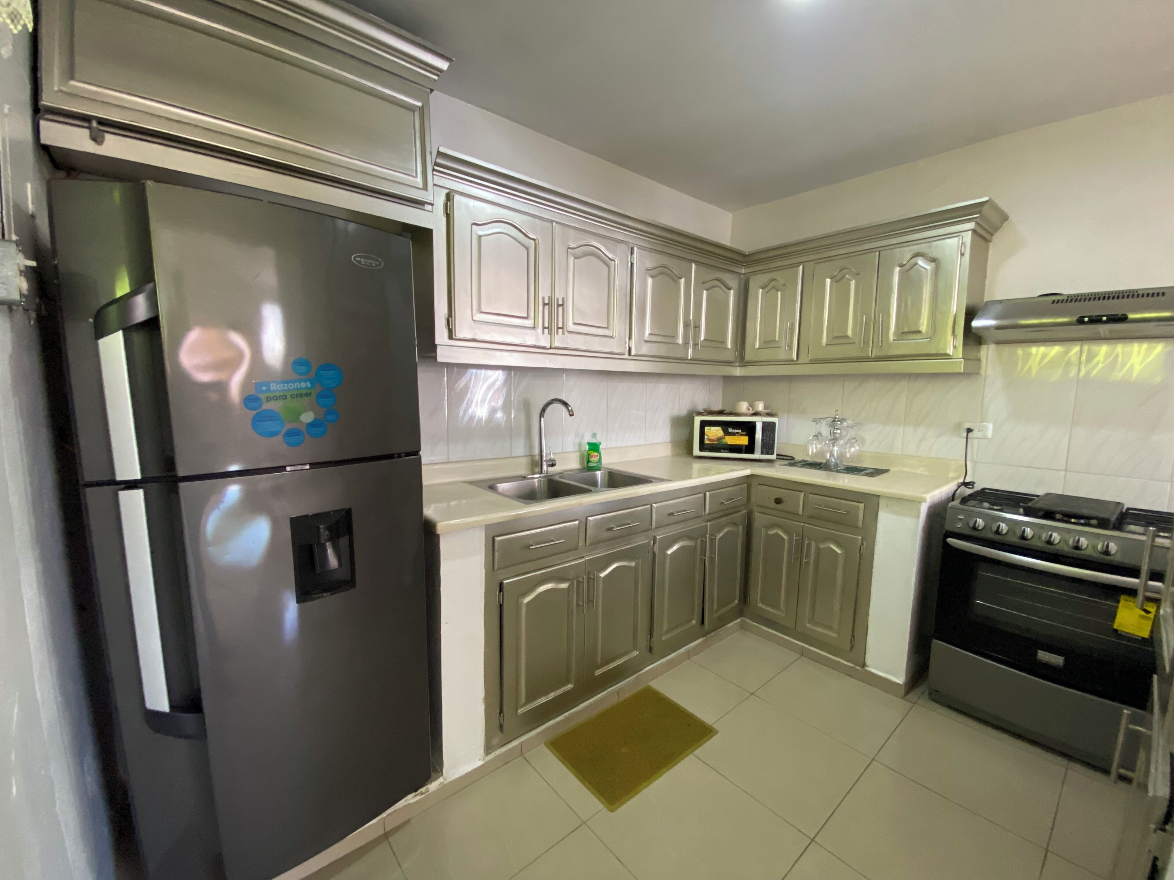 Apartment, 4 Bedrooms, Balcony, City View | Private kitchen | Stovetop, coffee/tea maker, dining tables