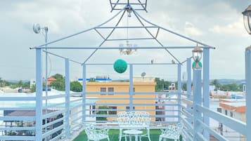 Apartment, 4 Bedrooms, Balcony, City View | Outdoor dining