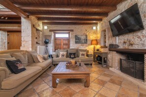Villa, 4 Bedrooms, Smoking, Private Pool | Living room | Flat-screen TV, fireplace, video-game console