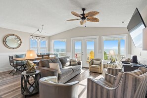 Flat-screen TV, DVD player, books