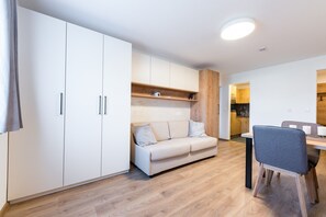 Comfort Apartment | Living area | 30-cm LCD TV with satellite channels, TV - TirolApart am Lift (Jochberg)