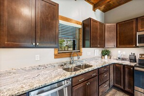 Fridge, oven, stovetop, cookware/dishes/utensils