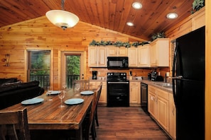 Fridge, oven, stovetop, cookware/dishes/utensils
