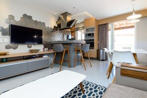 Casa conforto | Área de estar | TV de tela plana