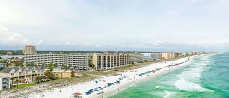 On the beach, sun-loungers, beach towels