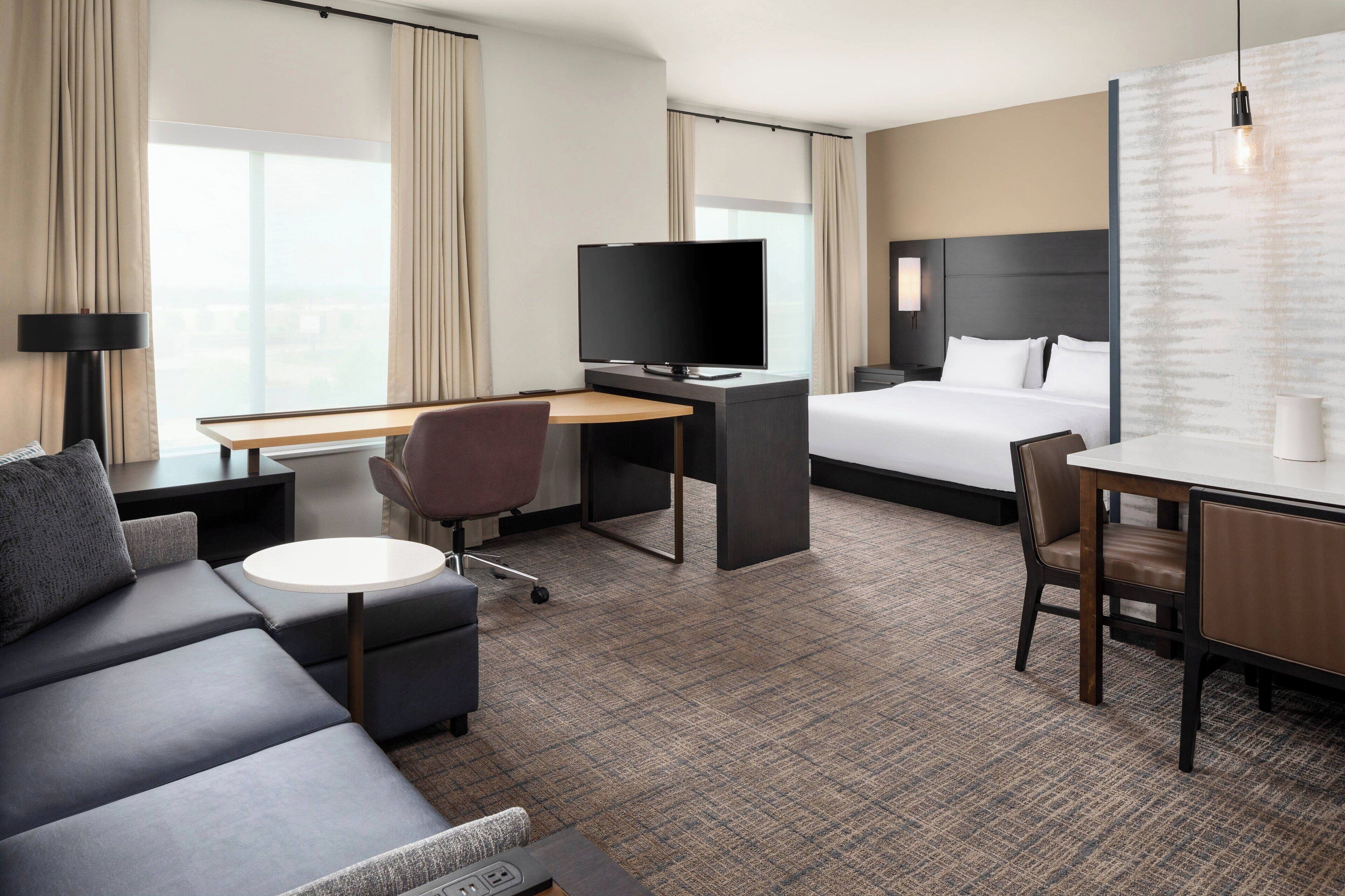 premium bedding, down duvets, desk, laptop workspace