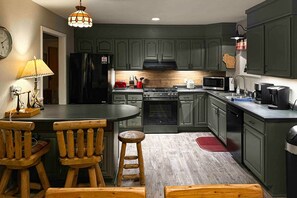 Fridge, microwave, oven, stovetop - Waterfront, dog-friendly home with dock, kayaks, NEW hot tub, game room, & AC (Eagle River)