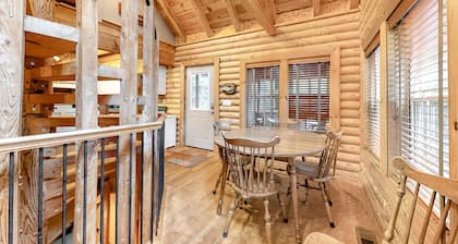 Dog-friendly, lakefront cabin for the whole family with private hot tub & dock