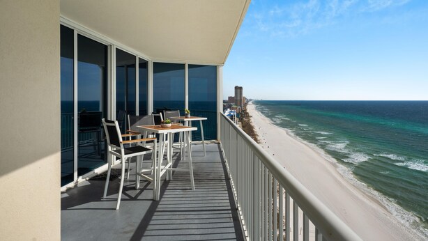 A balcony with a view of the beach and ocean. - Triple en-suite unit with miles-long views of the Gulf | Beach Chairs Included (Panama City Beach)