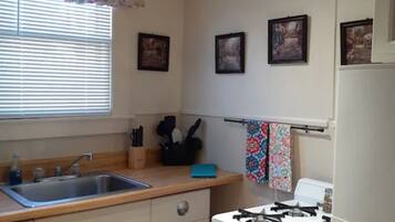 Microwave, coffee/tea maker, cookware/dishes/utensils