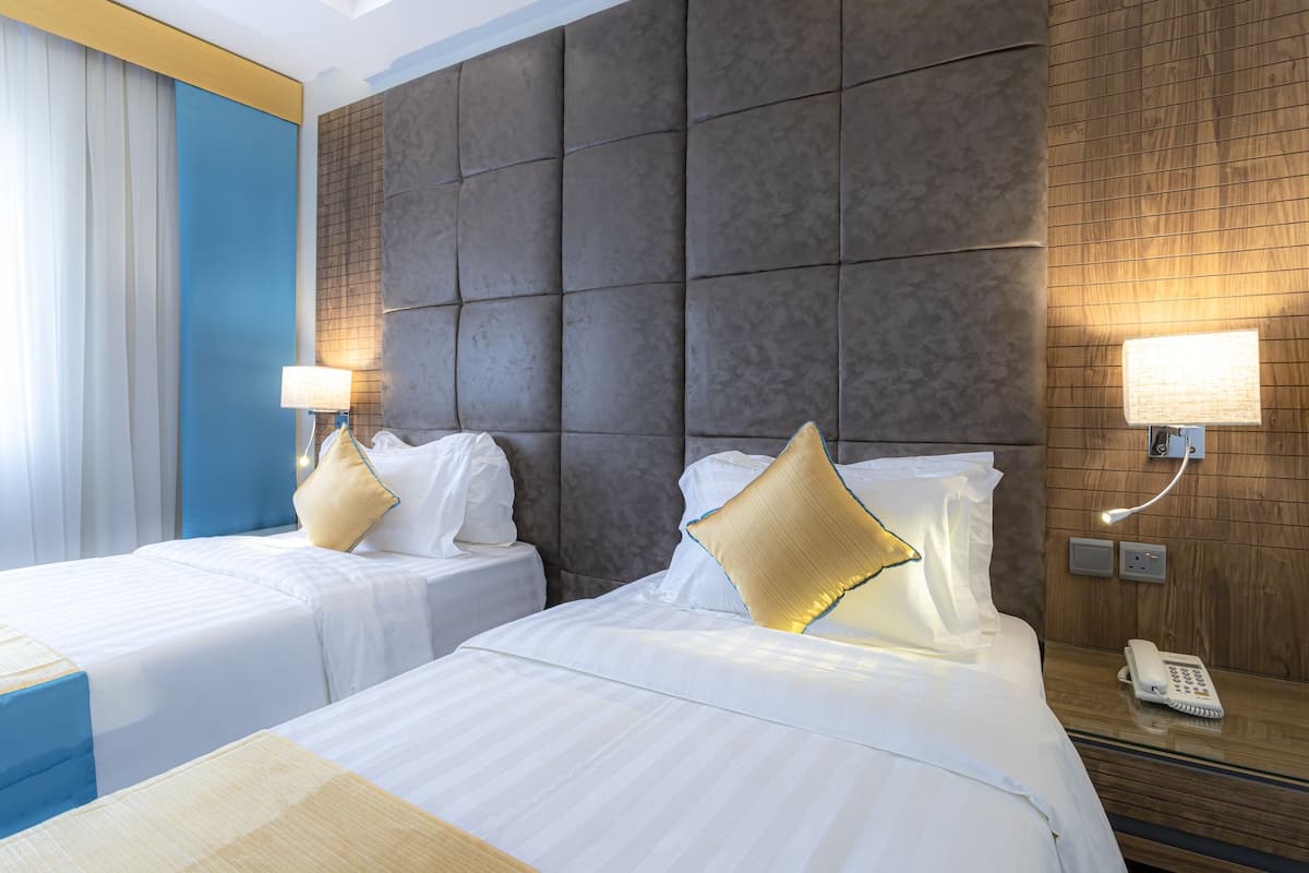 1 slaapkamer, een kluis op de kamer, verduisterende gordijnen