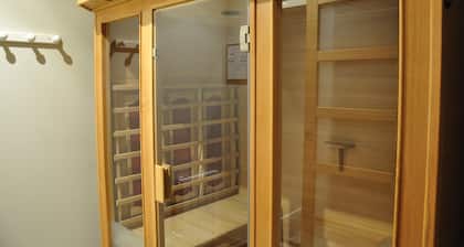 Cottage 10 people in a park with swimming pool