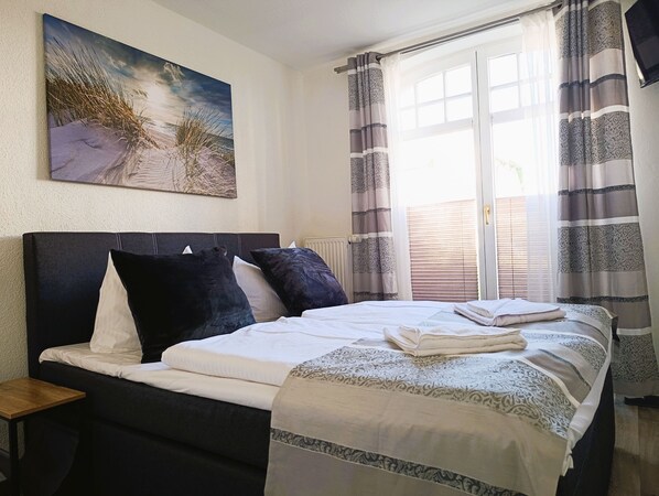 2 bedrooms, travel cot, WiFi, bed sheets