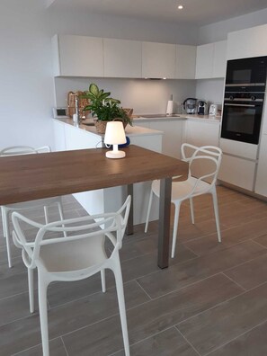 Dining - Air-conditioned corner apartmentSplendid views.FREE WIFI. ON THE BEACH 🏖️. (Platja d'Aro)