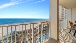 A balcony with a view of the beach and ocean. - Windward Pointe 502-Beachfront 3bd/2ba-Sleeps 8-Heart of Orange Beach (Orange Beach)