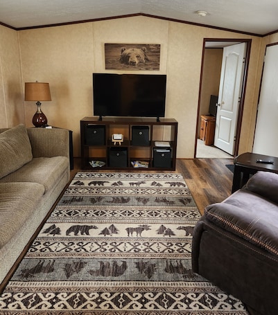 Smart TV, books. Beary Cozy Cabin