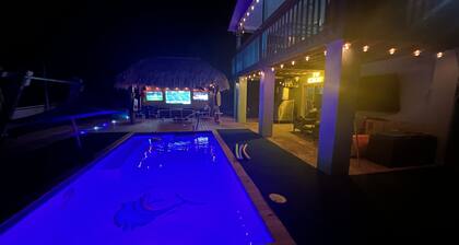 The most setup home in BPK TIKI HUT,POOL ,GRILL ,CANAL FRONT, FREE UNLIMITED ICE