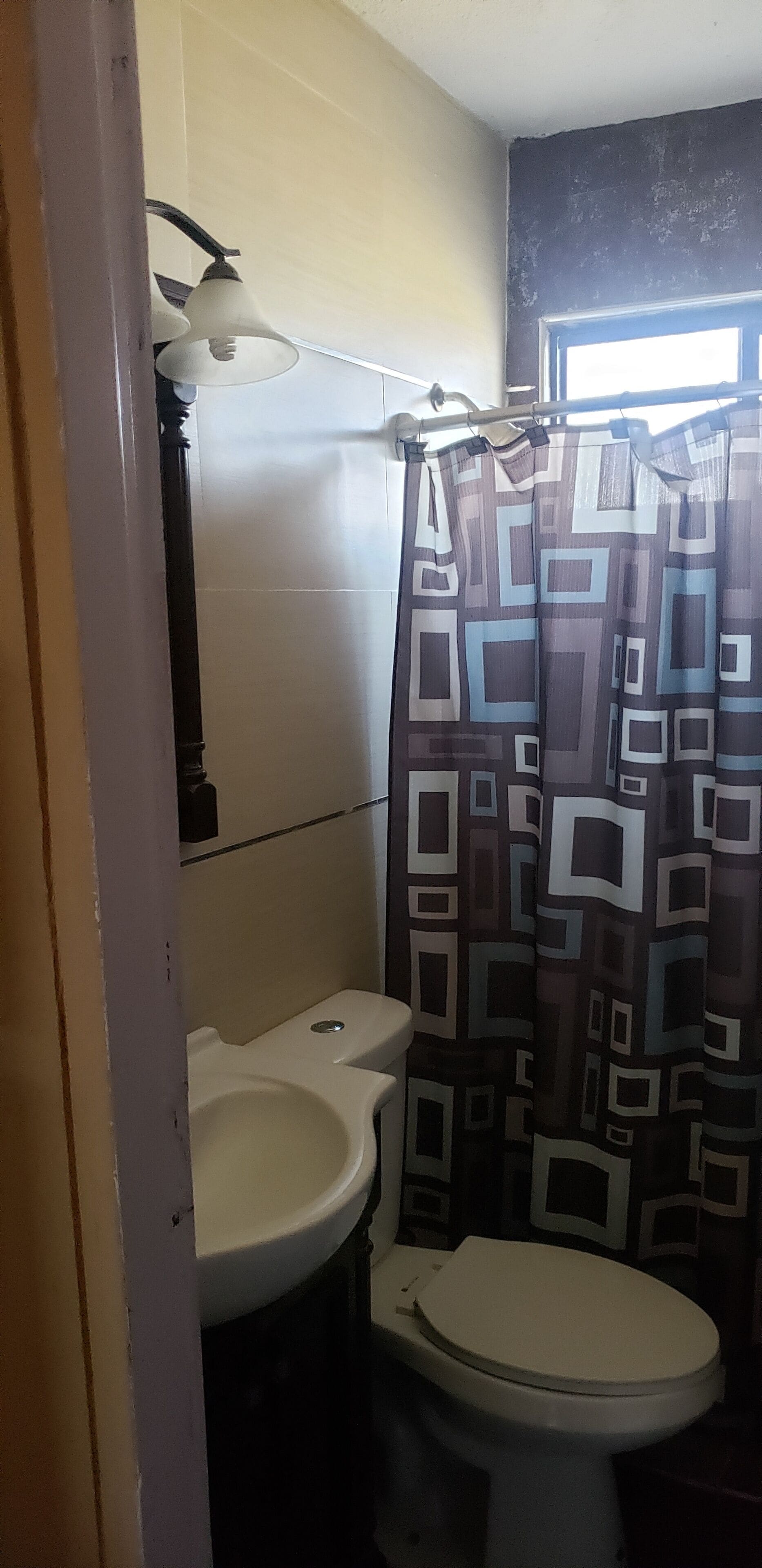 Basic Apartment | Bathroom | Shower, free toiletries, towels, soap