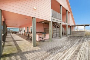 Outdoor dining - Spacious Home with Game Room, Deck & Bunk Room (Surfside)