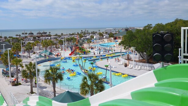 A resort with multiple swimming pools, water slides, and a view of the ocean. - Fun In the Sun ~ Ocean Lakes  (Myrtle Beach)