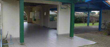 A covered outdoor area with a sign reading "Horizon 1".