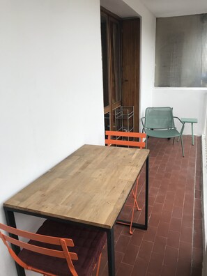 Enjoy an outdoor space with a table and chairs.