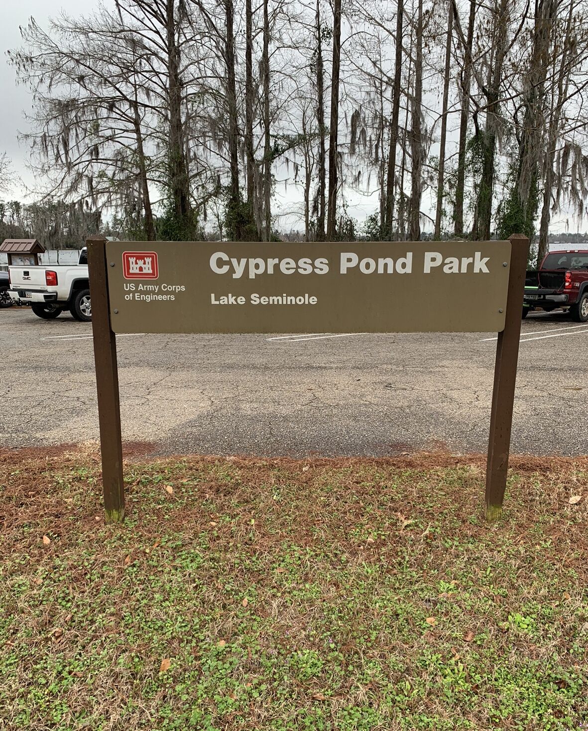 A sign for Cypress Pond Park, Lake Seminole, with a US Army Corps of Engineers logo.