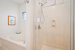 Combined shower/tub, hair dryer, towels, soap