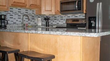 Fridge, microwave, oven, cookware/dishes/utensils