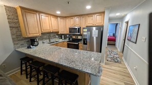 Fridge, microwave, oven, cookware/dishes/utensils