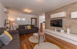 Smart TV, fireplace, foosball