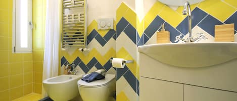 Hair dryer, towels, soap, shampoo