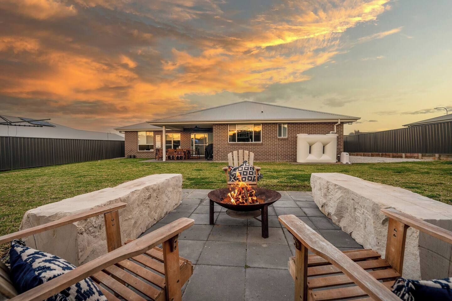 Gather around the fire pit for a cosy night together under the stars.
