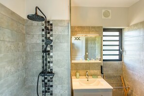 Shower, towels, soap, toilet paper