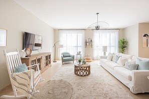 Family Apartment | Living area | 55-inch Smart TV with cable channels, TV