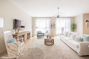 Family Apartment | Living area | 55-inch Smart TV with cable channels, TV
