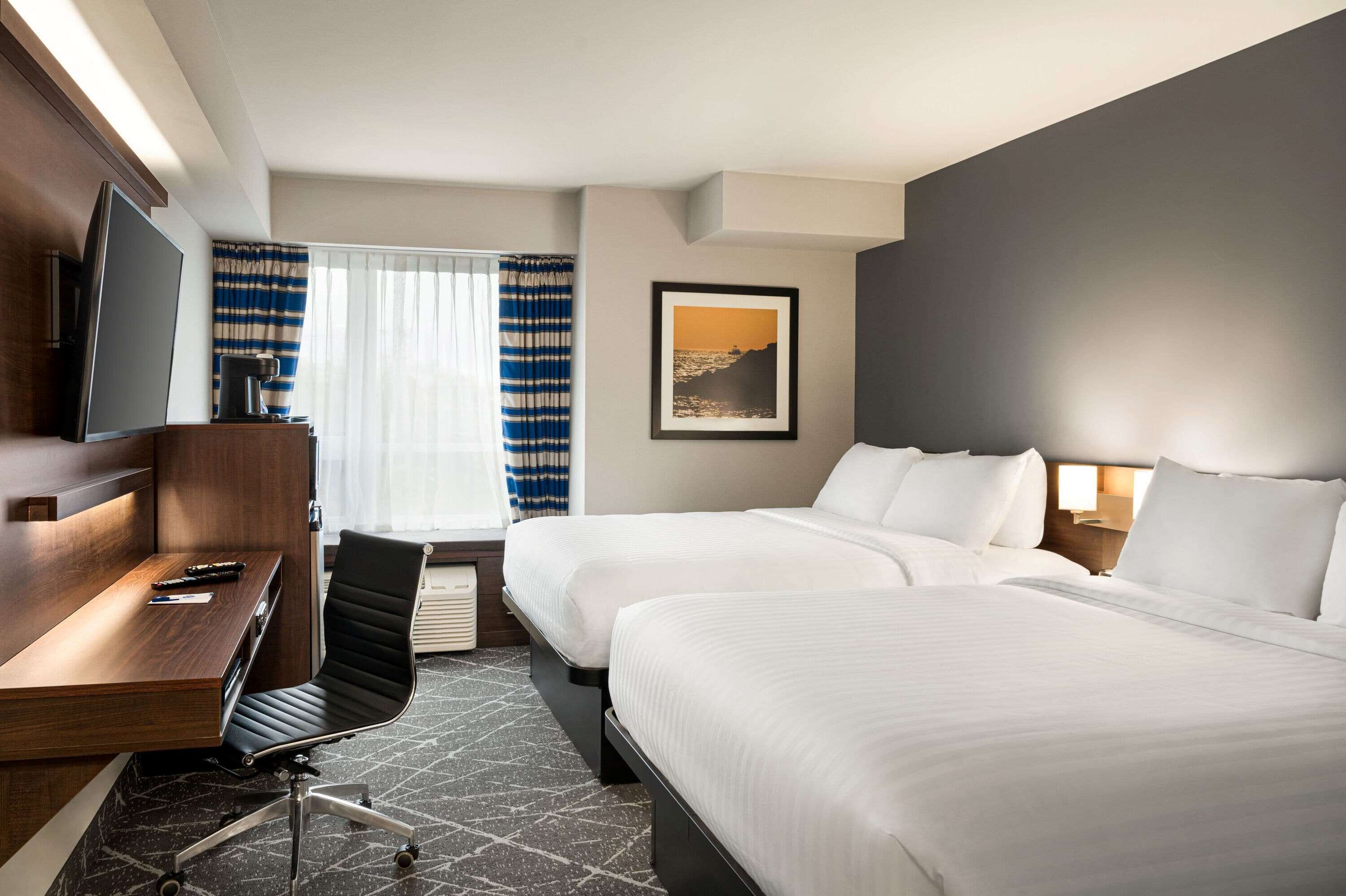 room, 2 queen beds, non smoking | desk, laptop workspace, iron/ironing board, free wifi