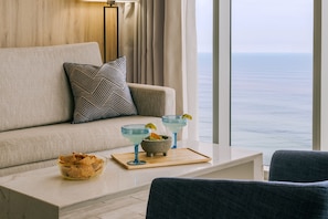 Superior Suite, 1 King Bed with Sofa bed, Ocean View | Living area
